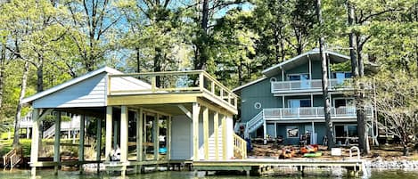 Double boathouse with upper deck.  Single slip available for guests (no lift).