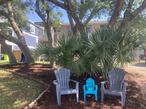 Have a drink while watching people walk to the beach. Located on a quiet street.