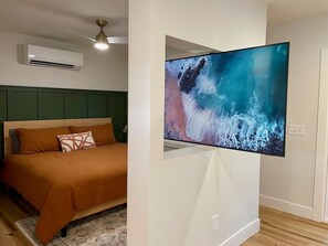 Smart TV that spins and can be viewed from living room or bedroom. 