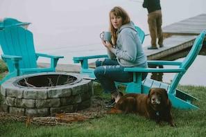 Enjoy peaceful mornings by the lake, sipping your coffee by the fire pit with your furry friend at your side.