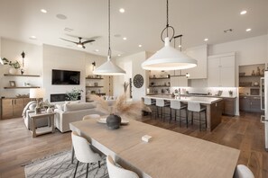 Dining Table View - With an open and spacious floor plan, the Dining Room and Kitchen can accommodate meal preparations for groups large or small.