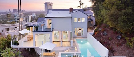 A beautiful traditional modern estate in the Hollywood Hills with views.