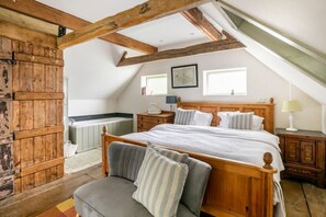 upstairs bedroom with a super king bed