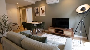 Gorgeous living room with a dining area and AC. #AC #cozy