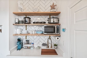 Stocked and stylish kitchenette