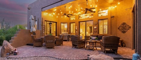 Patio Area with Bistro Lights, Heater and BBQ.