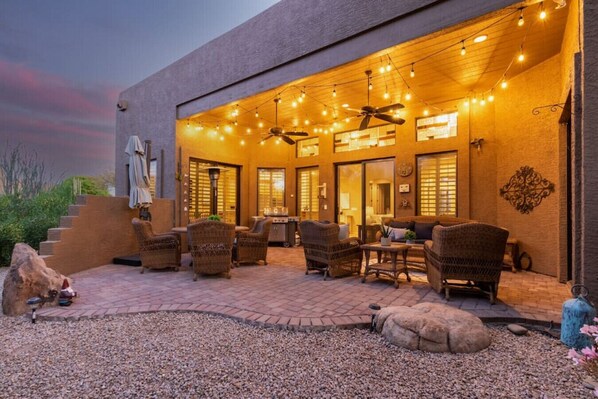 Patio Area with Bistro Lights, Heater and BBQ.