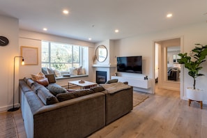 Living room with two beautiful views of Whistler and Blackcomb mountain