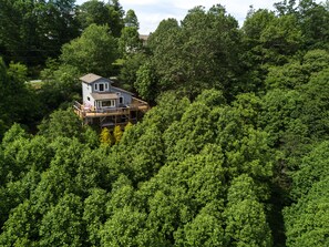 There are neighbors, but the house has a private feel due to all of the trees. 