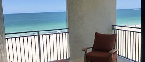 Relax on your breezy oceanfront balcony steps from Sand Key beach