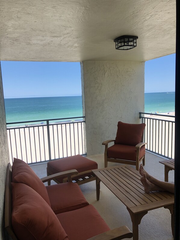 Relax on your breezy oceanfront balcony steps from Sand Key beach