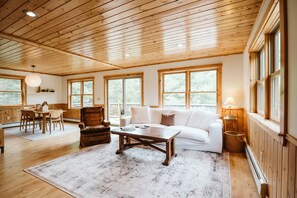 The living room is the heart of the home with its cozy sofas and open layout