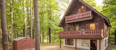 Discover this log cabin nestled in the woods.