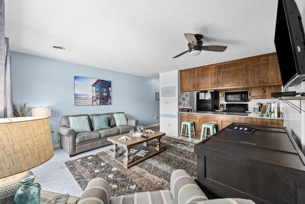 Living room with pullout sofa and a Murphy bed