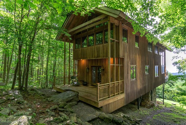 A modern architectural gem nestled among the trees, High Haven's design harmonizes with its natural surroundings.