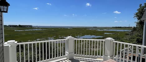 Second Floor Sundeck lounge chairs and umbrella View of Ocean City and Bay 