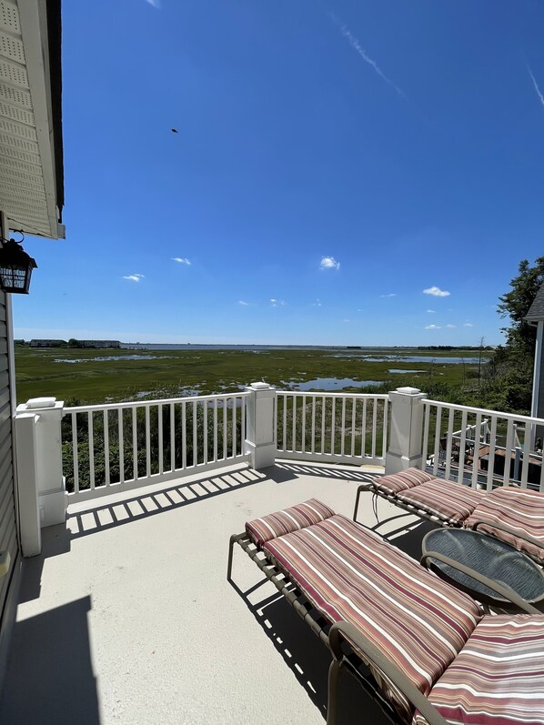 Second Floor Sundeck lounge chairs and umbrella View of Ocean City and Bay 