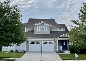 BayDreaming -Front Entrance Front Porch with sectional 2 car Garage parking 