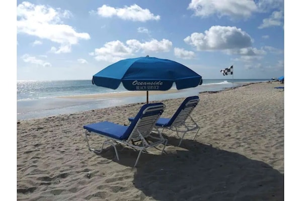 FREE - 2 Beach chairs and umbrella included with your stay!
