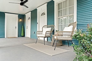 Enjoy a cocktail al fresco on this oversized covered patio with a large fan to keep you nice and cool.