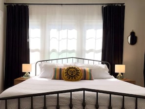 The secondary bedroom has another KING size bed! Enjoy the room's natural light during the day, then close the room-darkening curtains for a deep sleep.