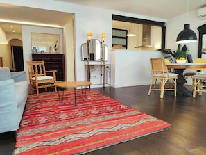 Open and luminous living room with comfortable sofa and stylish concept.