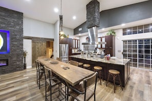 Kitchen included place ware and settings for up to 24 guests, pots and pans for cooking large meals, large roaster, crock pot, bread-maker, Keurig coffee machine, drip coffee machine, coffee grinder, full bar, and more.