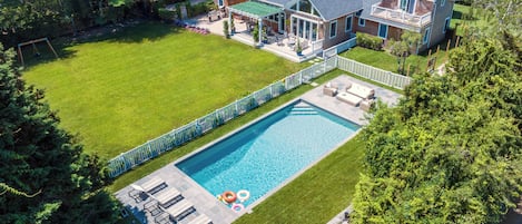 Large backyard and pool provides ample room for summertime fun