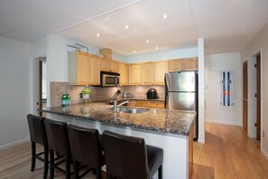 Breakfast bar with four stools