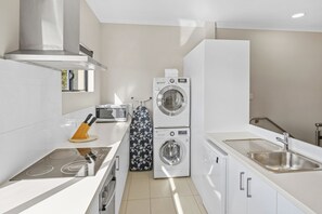 With a modern kitchen, you can opt to cook up a storm and enjoy it at the dining table.