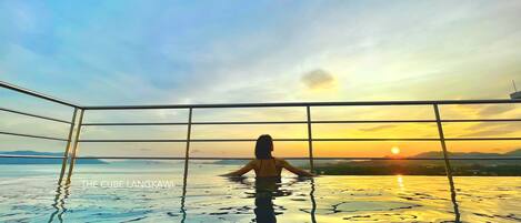 Rooftop Swimming Pool with Sunset View