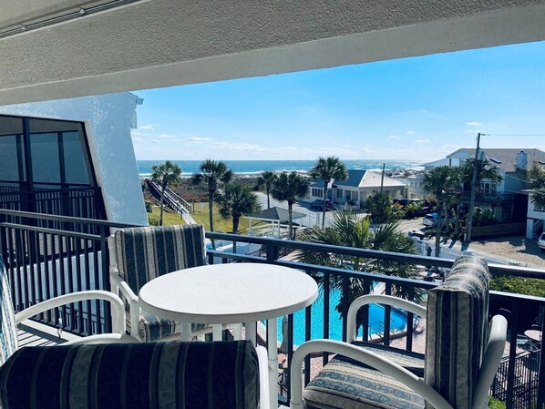 Ocean and pool view from balcony