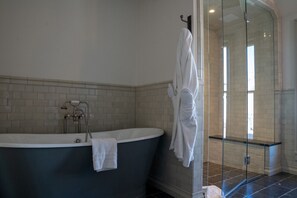 Glass enclosed shower and tub