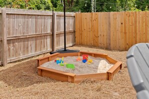 Can't make it to the beach? Have the little one make castles in the sandbox