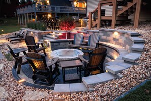 Fire pit setup with stunning lighting effects, creating the perfect mood for any evening.