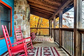 Covered porch with seating and grill
