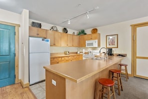 Furniture, Room, Indoors, Kitchen Island, Refrigerator
