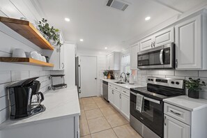 This spacious, fully-equipped kitchen makes cooking while on vacation a breeze!
