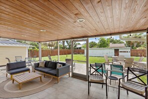 There is plenty of lounge furniture to kick back and relax on the covered patio!