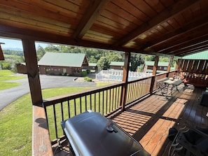 Grill on the back deck while watching the kids at the pool.