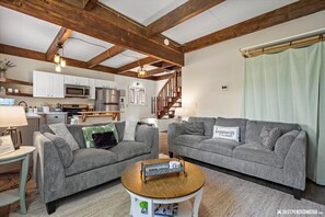 Guests love the open concept of The GreenHouse. The living space is downstairs and the bedroom is upstairs.