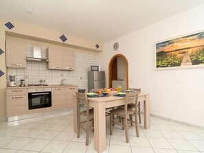Cabinetry, Countertop, Furniture, Building, Property, Table, Kitchen Appliance, Kitchen Stove, Wood, Kitchen