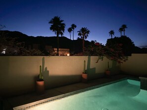 Enjoy 180-degree views of the Santa Rosa Mountains while night swimming 