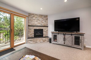 Living Area w/ Fireplace and TV