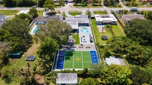 Football field, outdoor cinema, fire pit, and pool. That's just the backyard!