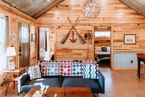 Oars and Decor, the Sofa is firm yet comfy. Lay the sofa flat for a 5th guest, we have the bedding available