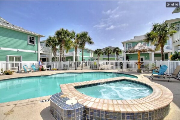 Sparkling pool and hot tub steps from your front door.