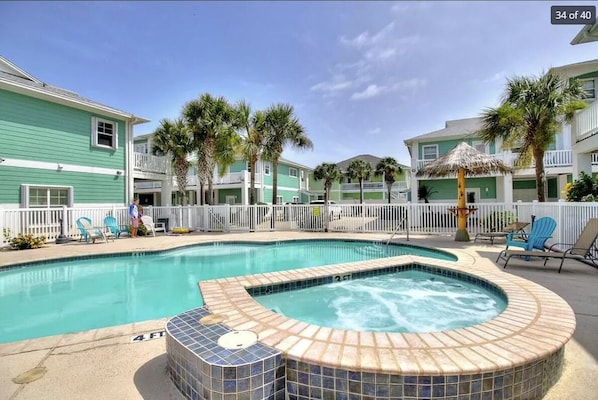 Sparkling pool and hot tub steps from your front door.