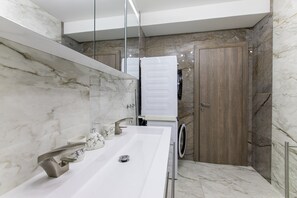 Bathroom with washing and drying machines