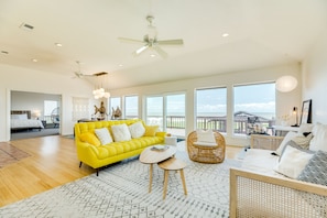 Bright and airy living area with wall of windows